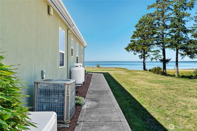 41 Gray Gables Ln, Hoquiam, WA 98550 - view of grassy yard featuring central AC unit and a water view