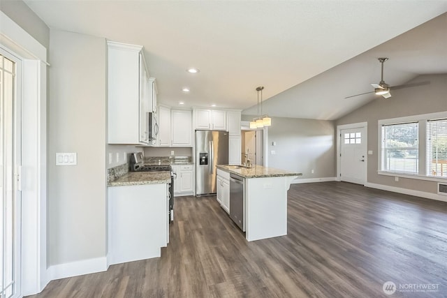 178 Pacific Blvd NW, Ocean Shores, WA 98569 - kitchen with a ceiling fan, a sink, white cabinetry, baseboards, and appliances with stainless steel finishes