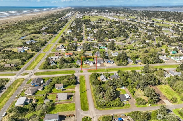 178 Pacific Blvd NW, Ocean Shores, WA 98569 - drone / aerial view featuring a water view and a residential view