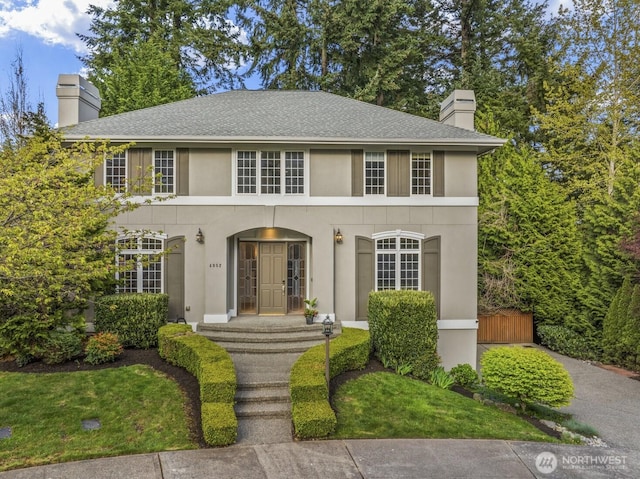 4952 160th Ct SE, Bellevue, WA 98006 - view of front of property featuring a chimney, stucco siding, and roof with shingles
