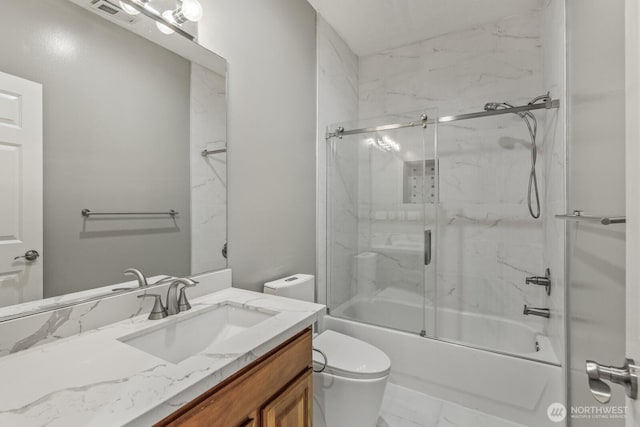 4952 160th Ct SE, Bellevue, WA 98006 - full bath with toilet, marble finish floor, enclosed tub / shower combo, visible vents, and vanity