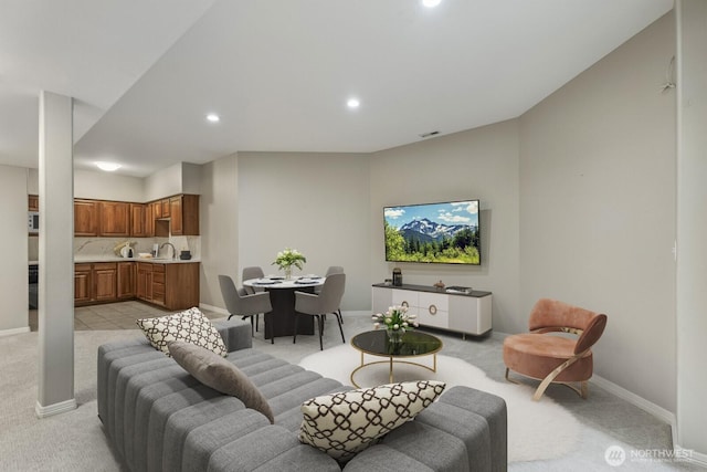 4952 160th Ct SE, Bellevue, WA 98006 - living area with light carpet, baseboards, visible vents, and recessed lighting
