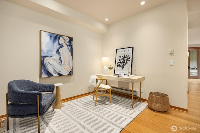 office area with baseboards, recessed lighting, a baseboard radiator, and wood finished floors