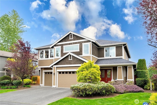 17288 NE 120th Way, Redmond, WA 98052 - craftsman-style house featuring an attached garage, a shingled roof, and aphalt driveway