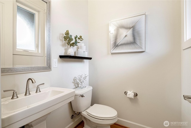 17288 NE 120th Way, Redmond, WA 98052 - half bath featuring baseboards, a sink, and toilet