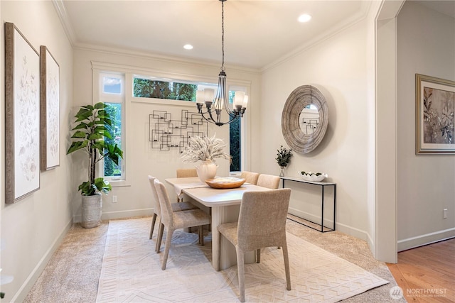 17288 NE 120th Way, Redmond, WA 98052 - dining area featuring crown molding, baseboards, and a chandelier
