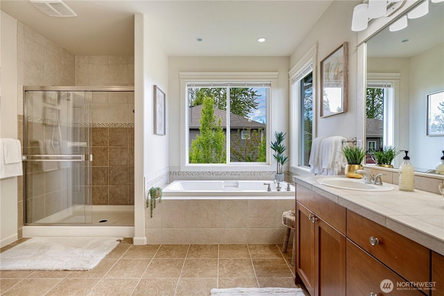 17288 NE 120th Way, Redmond, WA 98052 - full bathroom with visible vents, a bath, a wealth of natural light, and a shower stall