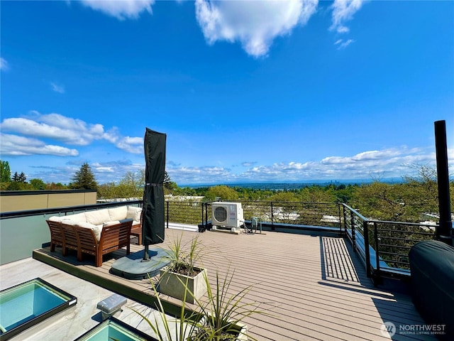 wooden deck featuring an outdoor living space