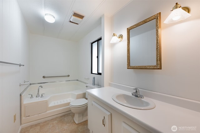 full bathroom featuring a bath, toilet, vanity, and visible vents