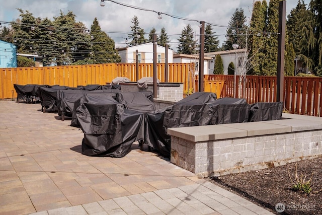 1121 244th St SW Unit 48, Bothell, WA 98021 - view of patio / terrace with a fenced backyard