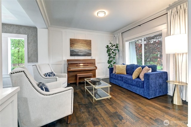 501 125th Ave NE, Lake Stevens, WA 98258 - living area with crown molding, dark wood-style flooring, and a decorative wall