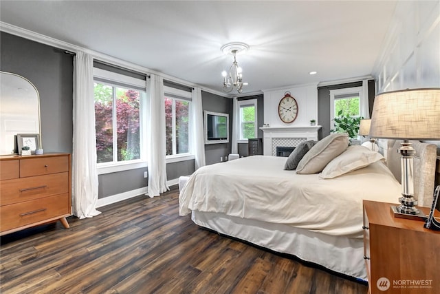 501 125th Ave NE, Lake Stevens, WA 98258 - bedroom with baseboards, ornamental molding, dark wood finished floors, and a chandelier