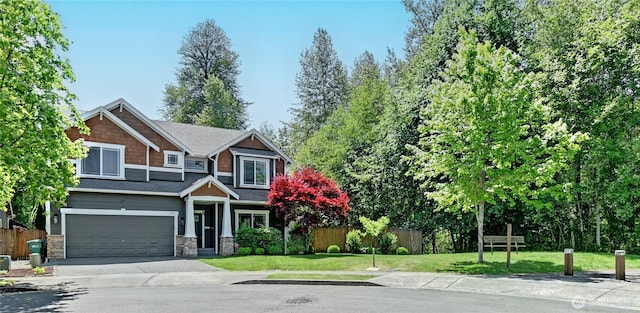 501 125th Ave NE, Lake Stevens, WA 98258 - craftsman-style house with a garage, stone siding, and driveway