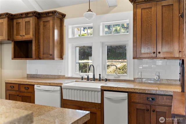 44 Alpine Ln, Okanogan, WA 98840 - kitchen with white dishwasher, a sink, tile countertops, and brown cabinets