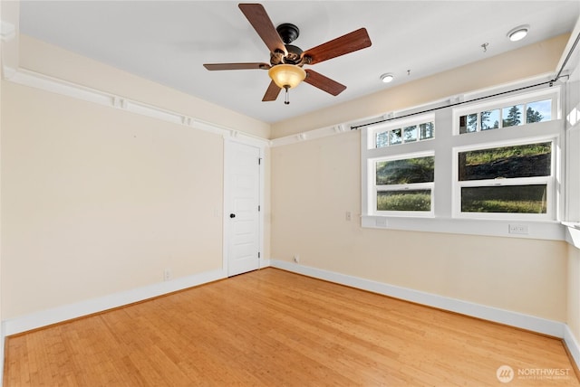 44 Alpine Ln, Okanogan, WA 98840 - spare room featuring wood finished floors, baseboards, and a ceiling fan