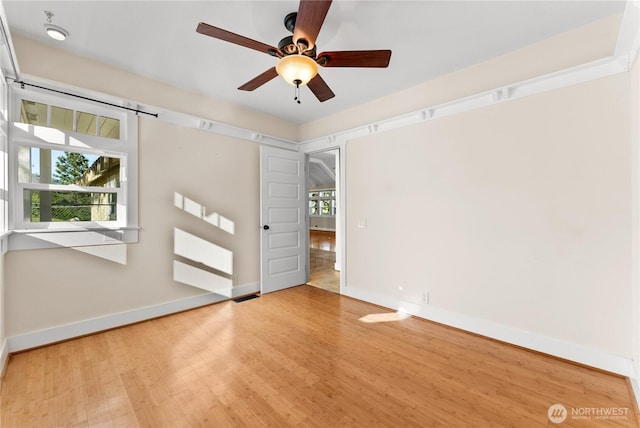 44 Alpine Ln, Okanogan, WA 98840 - empty room featuring a ceiling fan, wood finished floors, and baseboards