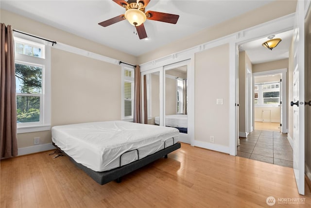 44 Alpine Ln, Okanogan, WA 98840 - bedroom with light wood-style floors, baseboards, and ceiling fan