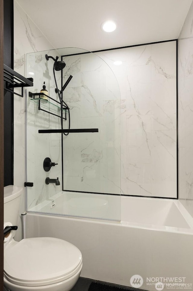 full bath featuring bathing tub / shower combination and toilet
