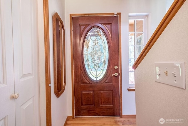 foyer with light wood-type flooring