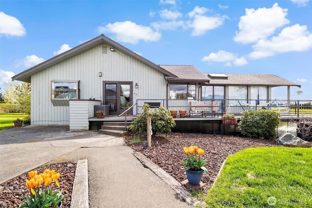 5752 Ronnie Hill Ln, Ferndale, WA 98248 - back of house featuring a wooden deck