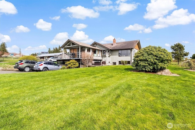 5752 Ronnie Hill Ln, Ferndale, WA 98248 - view of front of home with a sunroom and a front lawn