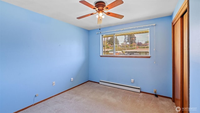 unfurnished bedroom featuring a closet, a baseboard radiator, carpet, and baseboards