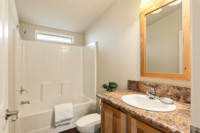 full bathroom with washtub / shower combination, toilet, and vanity
