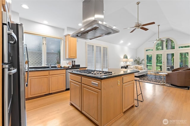3307 Sahalee Way NE, Sammamish, WA 98074 - kitchen with dark countertops, island range hood, appliances with stainless steel finishes, open floor plan, and ceiling fan