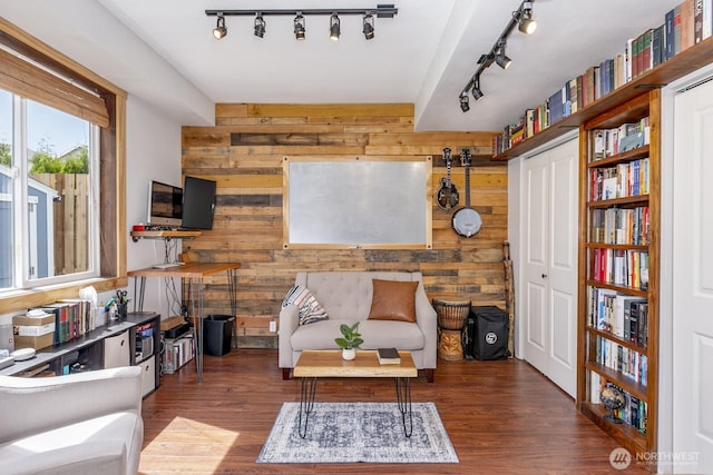 6426 128th Pl SE, Snohomish, WA 98296 - sitting room with wood walls, rail lighting, and wood finished floors