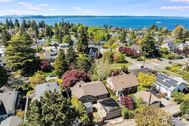 bird's eye view featuring a residential view and a water view