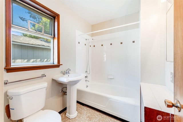 full bathroom featuring shower / tub combination, a sink, and toilet