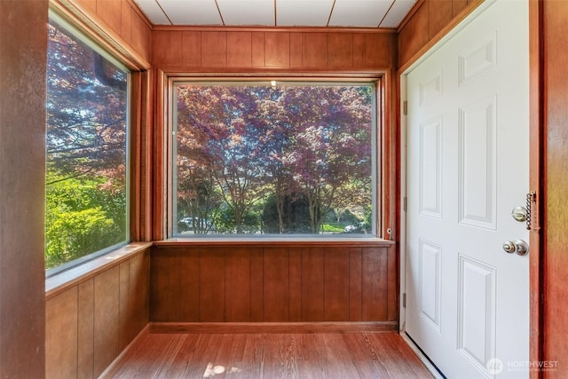 unfurnished sunroom with a healthy amount of sunlight