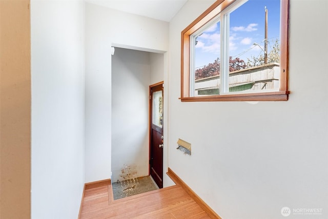 doorway with wood finished floors