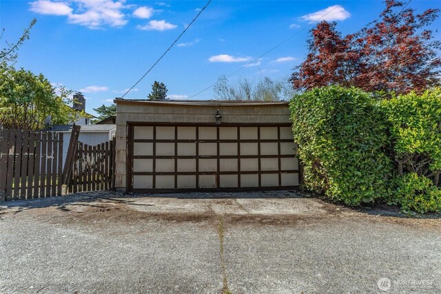 detached garage with fence