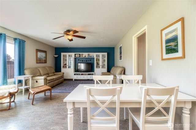 dining area with ceiling fan