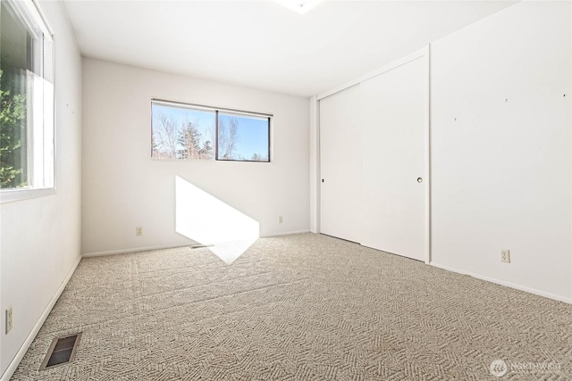 3884 Fort Bellingham Rd, Bellingham, WA 98225 - spare room with baseboards, visible vents, and carpet flooring