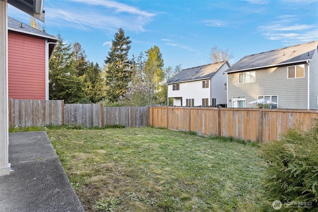 view of yard featuring a fenced backyard