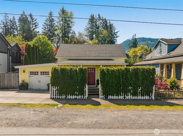 245 SE Bush St, Issaquah, WA 98027 - view of front of home with a garage and driveway