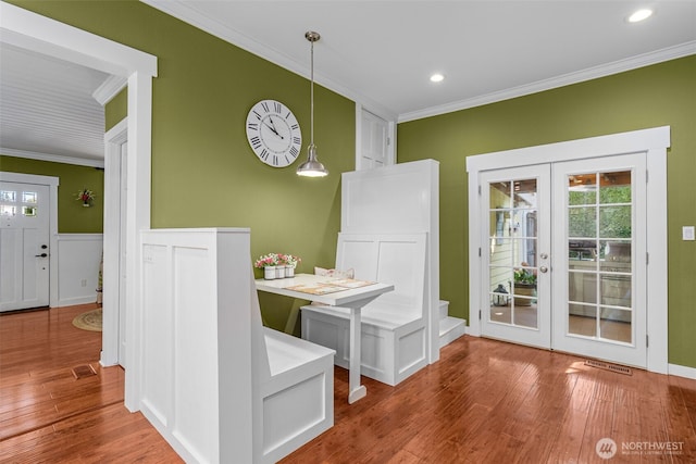 245 SE Bush St, Issaquah, WA 98027 - dining area featuring ornamental molding, french doors, wood finished floors, and recessed lighting