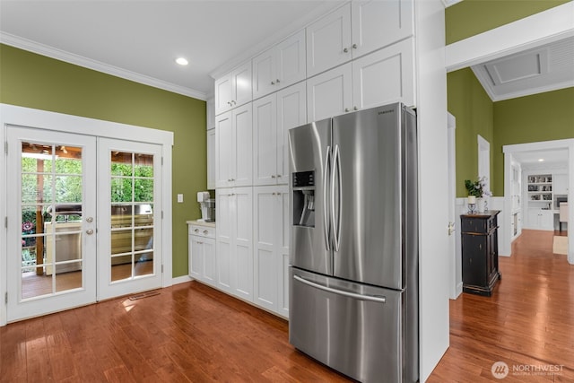 245 SE Bush St, Issaquah, WA 98027 - kitchen featuring stainless steel refrigerator with ice dispenser, ornamental molding, french doors, dark wood finished floors, and white cabinetry