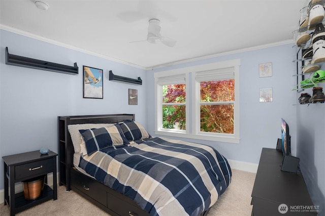 245 SE Bush St, Issaquah, WA 98027 - bedroom featuring carpet floors, ornamental molding, baseboards, and a ceiling fan