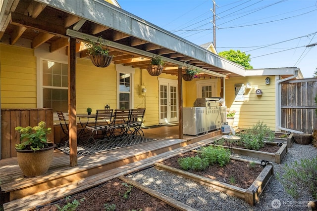 245 SE Bush St, Issaquah, WA 98027 - wooden deck featuring a vegetable garden