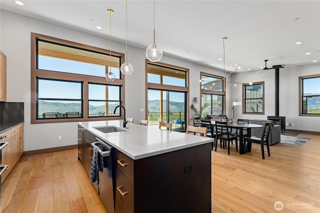 kitchen featuring a sink, stainless steel dishwasher, ceiling fan, recessed lighting, and modern cabinets