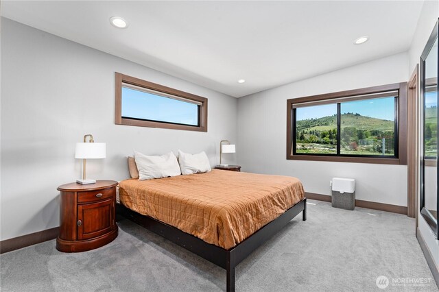 carpeted bedroom with baseboards and recessed lighting