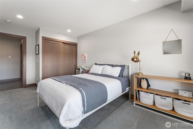 carpeted bedroom with a closet, recessed lighting, and baseboards