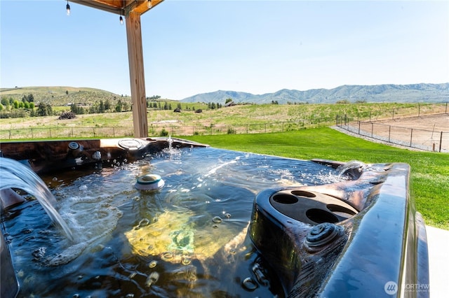 exterior view of fence and a mountain view