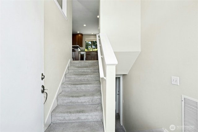 2524 171st St SE, Bothell, WA 98012 - staircase featuring baseboards and recessed lighting