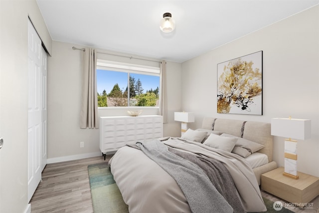2524 171st St SE, Bothell, WA 98012 - bedroom featuring light wood-type flooring and baseboards