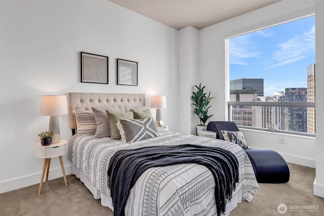 737 Olive Way Unit 3101, Seattle, WA 98101 - bedroom featuring carpet flooring, multiple windows, and baseboards
