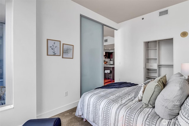 737 Olive Way Unit 3101, Seattle, WA 98101 - bedroom featuring carpet and baseboards